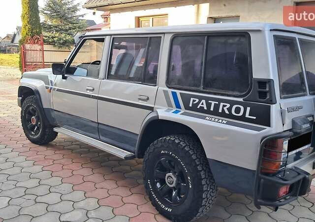 Серый Ниссан Патрол, объемом двигателя 2.8 л и пробегом 300 тыс. км за 9997 $, фото 21 на Automoto.ua