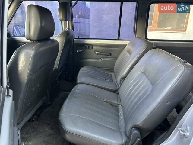 Серый Ниссан Патрол, объемом двигателя 2.8 л и пробегом 234 тыс. км за 9300 $, фото 9 на Automoto.ua