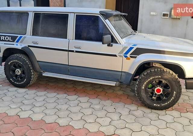 Серый Ниссан Патрол, объемом двигателя 2.8 л и пробегом 300 тыс. км за 9997 $, фото 10 на Automoto.ua