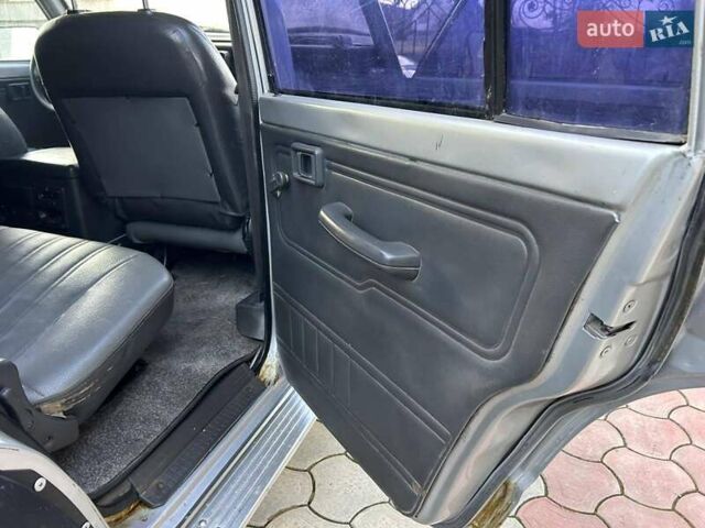 Серый Ниссан Патрол, объемом двигателя 2.8 л и пробегом 234 тыс. км за 9300 $, фото 17 на Automoto.ua