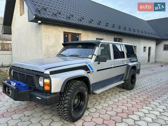 Серый Ниссан Патрол, объемом двигателя 2.8 л и пробегом 234 тыс. км за 9300 $, фото 13 на Automoto.ua