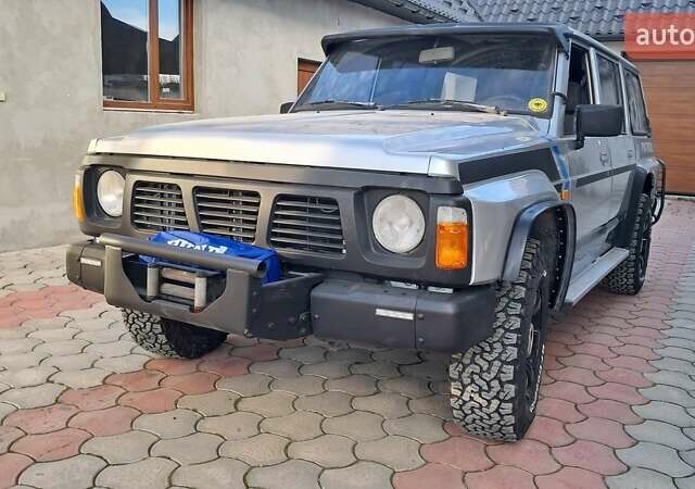 Серый Ниссан Патрол, объемом двигателя 2.8 л и пробегом 300 тыс. км за 9997 $, фото 13 на Automoto.ua