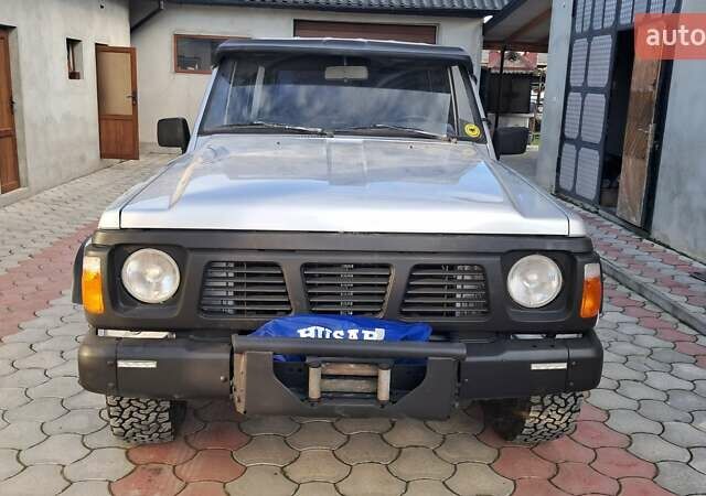 Серый Ниссан Патрол, объемом двигателя 2.8 л и пробегом 300 тыс. км за 9997 $, фото 4 на Automoto.ua