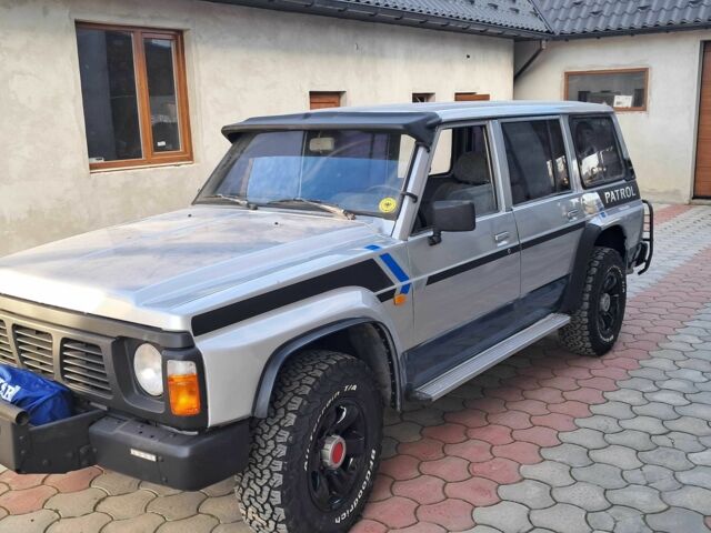 Серый Ниссан Патрол, объемом двигателя 2.8 л и пробегом 234 тыс. км за 9999 $, фото 14 на Automoto.ua