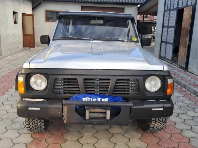 Серый Ниссан Патрол, объемом двигателя 2.8 л и пробегом 234 тыс. км за 9999 $, фото 3 на Automoto.ua