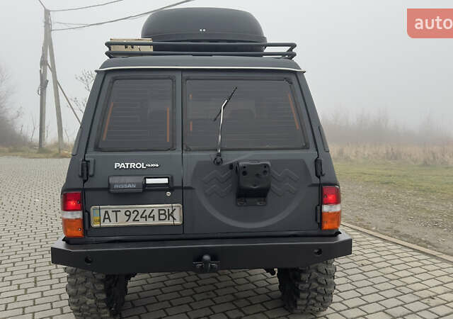 Серый Ниссан Патрол, объемом двигателя 2.8 л и пробегом 270 тыс. км за 16500 $, фото 13 на Automoto.ua