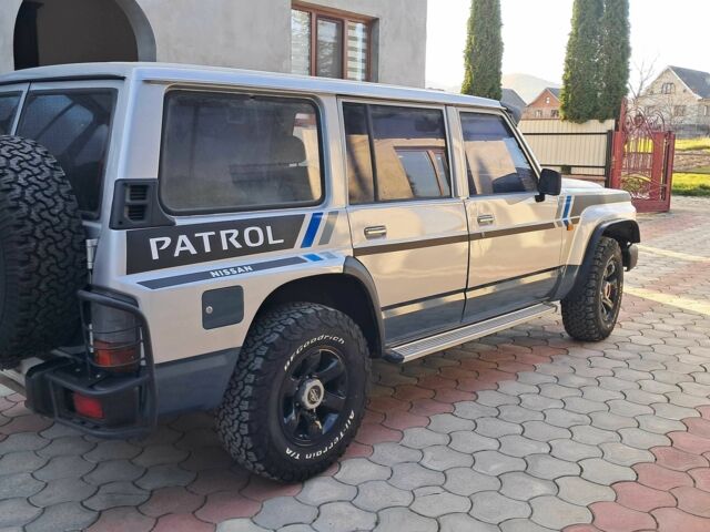 Серый Ниссан Патрол, объемом двигателя 2.8 л и пробегом 234 тыс. км за 9999 $, фото 5 на Automoto.ua