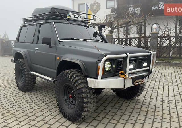 Серый Ниссан Патрол, объемом двигателя 2.8 л и пробегом 270 тыс. км за 16500 $, фото 5 на Automoto.ua