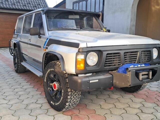 Серый Ниссан Патрол, объемом двигателя 2.8 л и пробегом 234 тыс. км за 9999 $, фото 10 на Automoto.ua