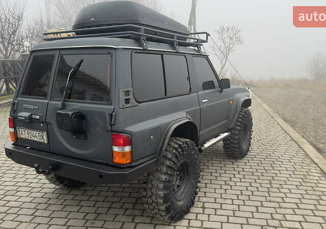 Серый Ниссан Патрол, объемом двигателя 2.8 л и пробегом 270 тыс. км за 16500 $, фото 10 на Automoto.ua