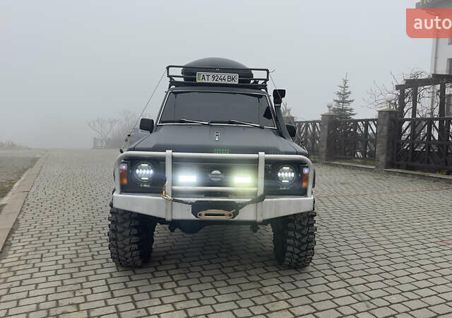 Серый Ниссан Патрол, объемом двигателя 2.8 л и пробегом 270 тыс. км за 16500 $, фото 3 на Automoto.ua