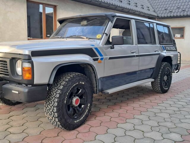 Серый Ниссан Патрол, объемом двигателя 2.8 л и пробегом 234 тыс. км за 9999 $, фото 13 на Automoto.ua