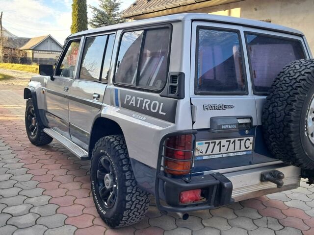 Серый Ниссан Патрол, объемом двигателя 2.8 л и пробегом 234 тыс. км за 9999 $, фото 20 на Automoto.ua