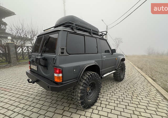 Серый Ниссан Патрол, объемом двигателя 2.8 л и пробегом 270 тыс. км за 16500 $, фото 23 на Automoto.ua