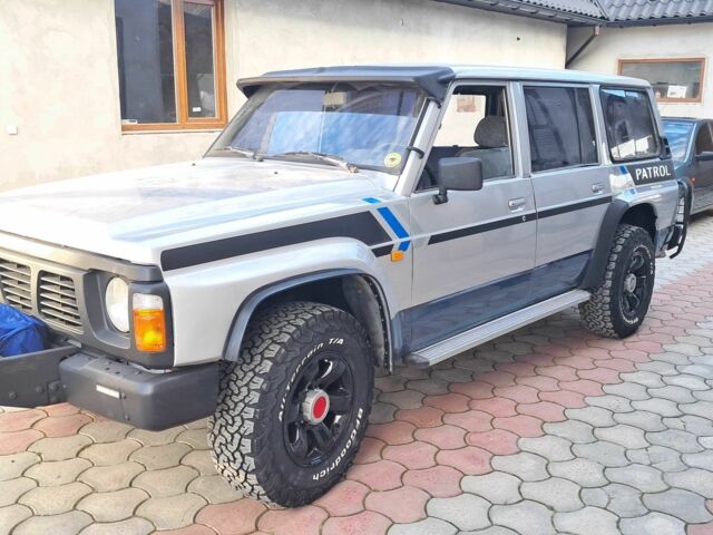 Серый Ниссан Патрол, объемом двигателя 2.8 л и пробегом 234 тыс. км за 9999 $, фото 1 на Automoto.ua
