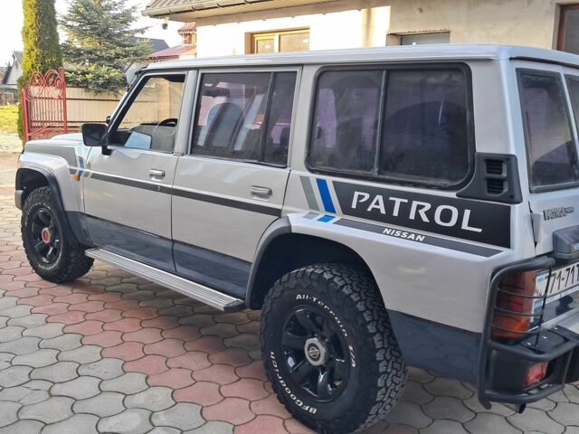 Серый Ниссан Патрол, объемом двигателя 2.8 л и пробегом 234 тыс. км за 9999 $, фото 19 на Automoto.ua