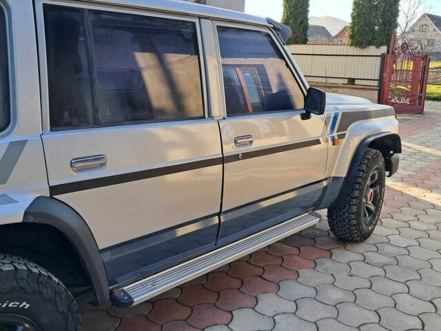 Серый Ниссан Патрол, объемом двигателя 2.8 л и пробегом 234 тыс. км за 9999 $, фото 7 на Automoto.ua