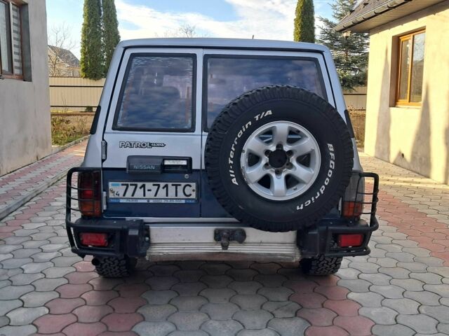 Серый Ниссан Патрол, объемом двигателя 2.8 л и пробегом 234 тыс. км за 9999 $, фото 23 на Automoto.ua