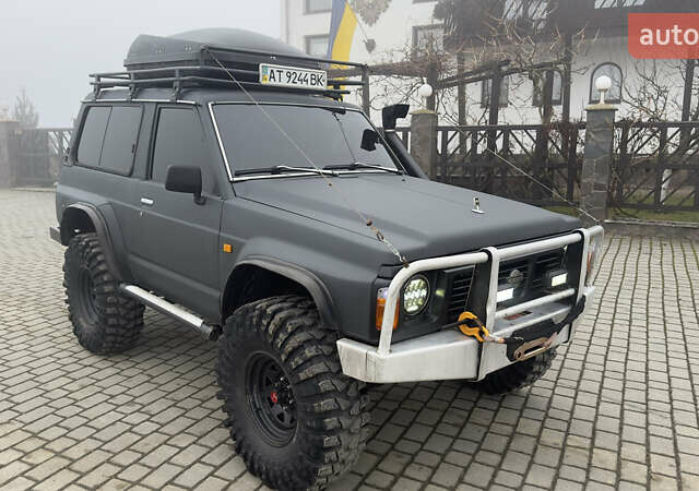 Серый Ниссан Патрол, объемом двигателя 2.8 л и пробегом 270 тыс. км за 16500 $, фото 6 на Automoto.ua