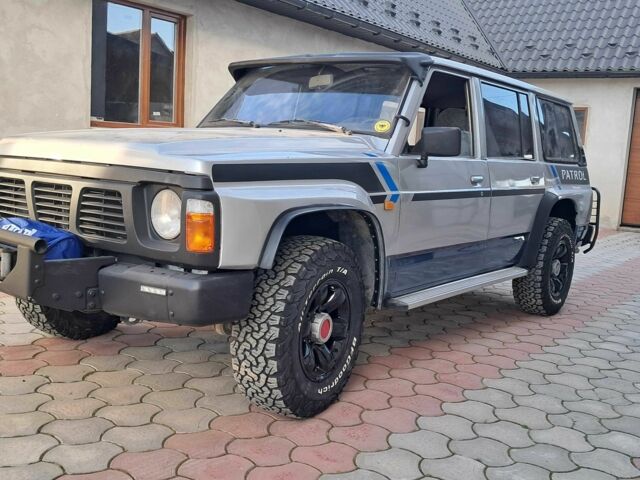 Серый Ниссан Патрол, объемом двигателя 2.8 л и пробегом 234 тыс. км за 9999 $, фото 12 на Automoto.ua