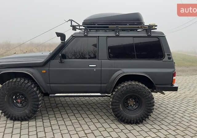 Серый Ниссан Патрол, объемом двигателя 2.8 л и пробегом 270 тыс. км за 16500 $, фото 19 на Automoto.ua