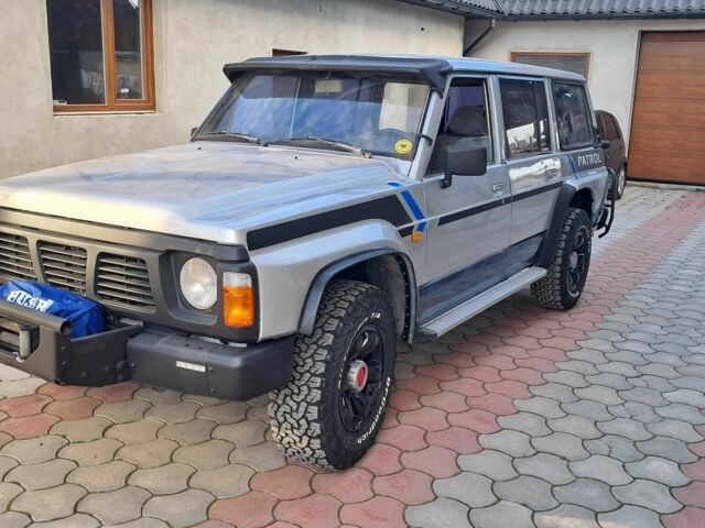 Серый Ниссан Патрол, объемом двигателя 2.8 л и пробегом 234 тыс. км за 9999 $, фото 2 на Automoto.ua