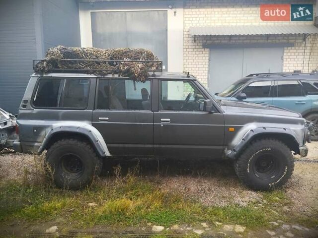 Серый Ниссан Патрол, объемом двигателя 2.8 л и пробегом 300 тыс. км за 12000 $, фото 1 на Automoto.ua