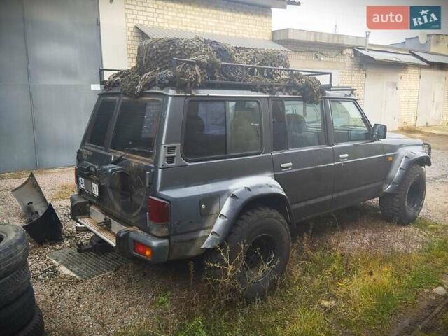 Серый Ниссан Патрол, объемом двигателя 2.8 л и пробегом 300 тыс. км за 12000 $, фото 2 на Automoto.ua