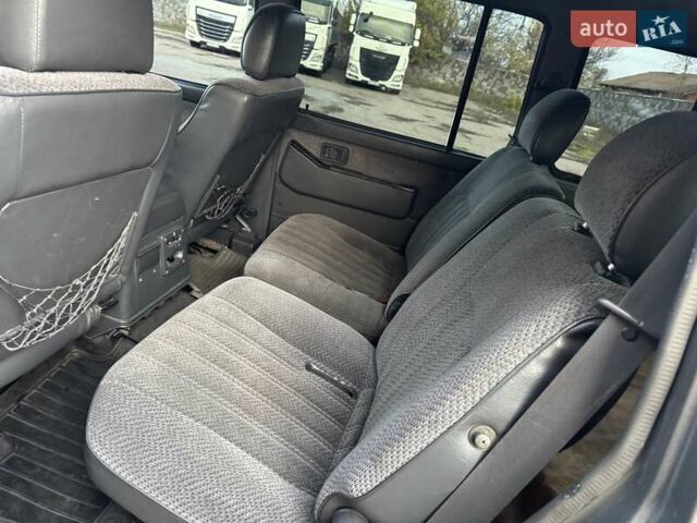 Сірий Ніссан Патрол, об'ємом двигуна 3 л та пробігом 296 тис. км за 12800 $, фото 22 на Automoto.ua