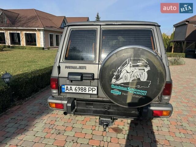 Сірий Ніссан Патрол, об'ємом двигуна 3 л та пробігом 296 тис. км за 12800 $, фото 12 на Automoto.ua