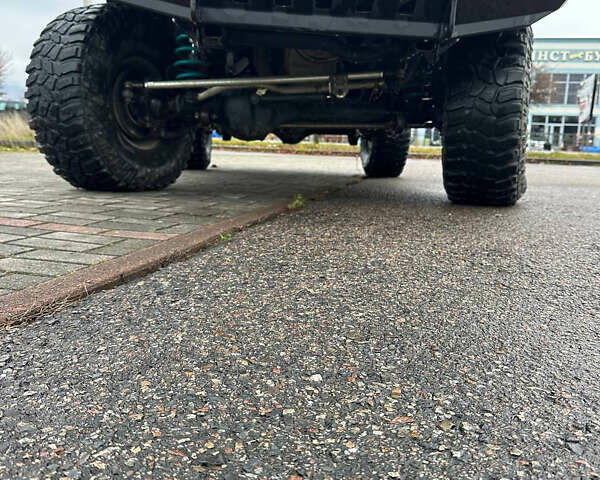 Серый Ниссан Патрол, объемом двигателя 2.95 л и пробегом 222 тыс. км за 25000 $, фото 8 на Automoto.ua