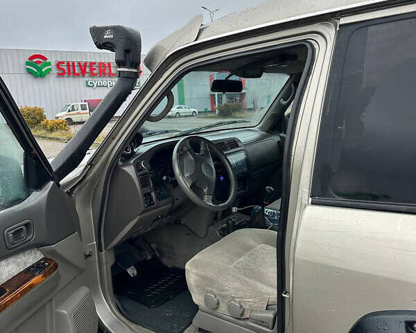 Серый Ниссан Патрол, объемом двигателя 2.95 л и пробегом 222 тыс. км за 25000 $, фото 9 на Automoto.ua