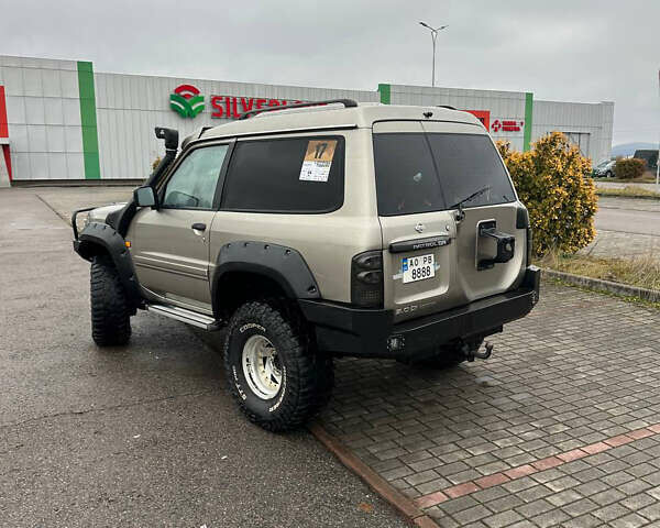 Серый Ниссан Патрол, объемом двигателя 2.95 л и пробегом 222 тыс. км за 25000 $, фото 4 на Automoto.ua