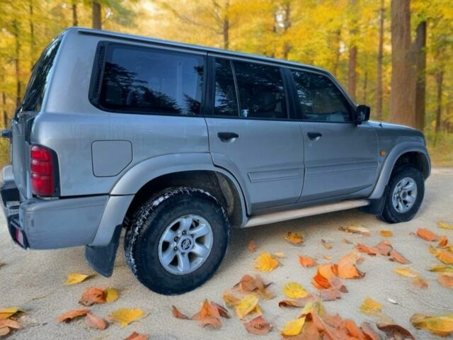 Серый Ниссан Патрол, объемом двигателя 3 л и пробегом 170 тыс. км за 8999 $, фото 1 на Automoto.ua