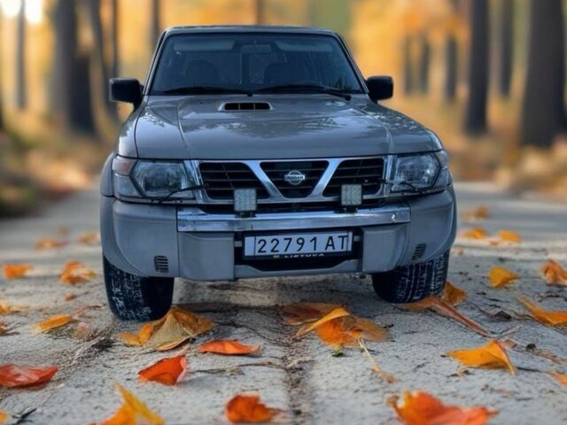 Серый Ниссан Патрол, объемом двигателя 3 л и пробегом 170 тыс. км за 8999 $, фото 2 на Automoto.ua