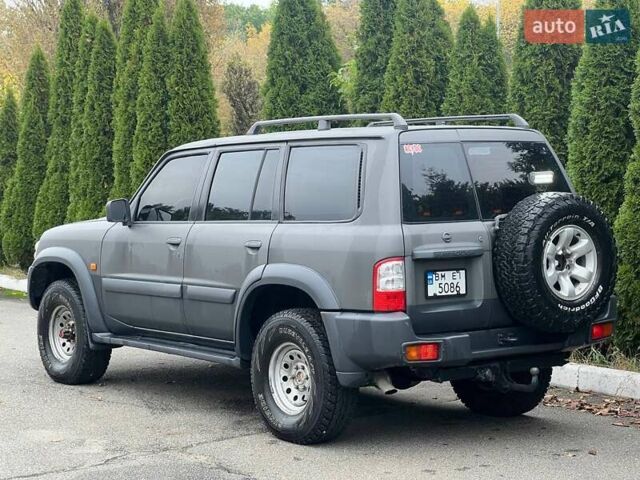 Серый Ниссан Патрол, объемом двигателя 3 л и пробегом 446 тыс. км за 15900 $, фото 5 на Automoto.ua