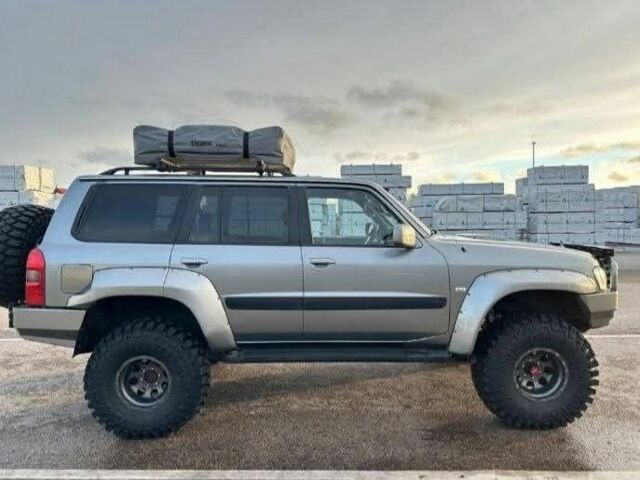 Сірий Ніссан Патрол, об'ємом двигуна 3 л та пробігом 244 тис. км за 3838 $, фото 4 на Automoto.ua