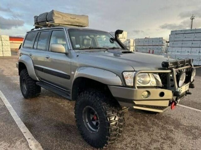 Сірий Ніссан Патрол, об'ємом двигуна 3 л та пробігом 244 тис. км за 3838 $, фото 2 на Automoto.ua