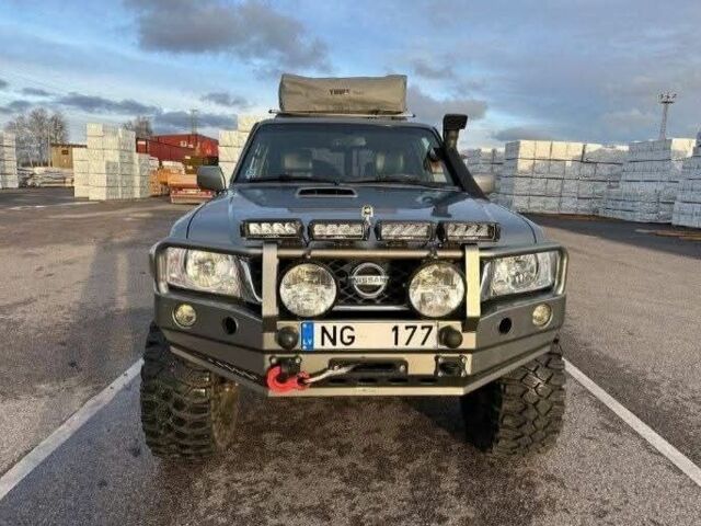 Сірий Ніссан Патрол, об'ємом двигуна 3 л та пробігом 244 тис. км за 3838 $, фото 1 на Automoto.ua