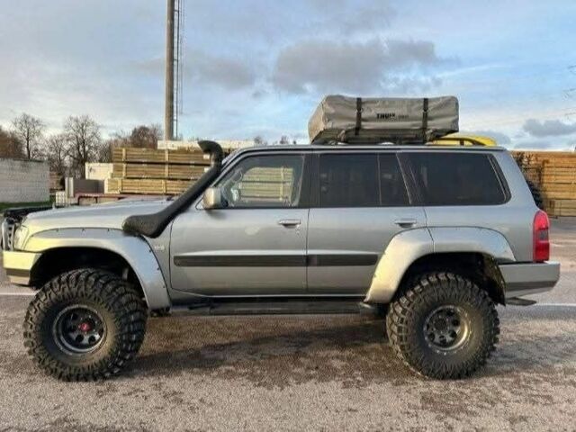 Сірий Ніссан Патрол, об'ємом двигуна 3 л та пробігом 244 тис. км за 3838 $, фото 3 на Automoto.ua