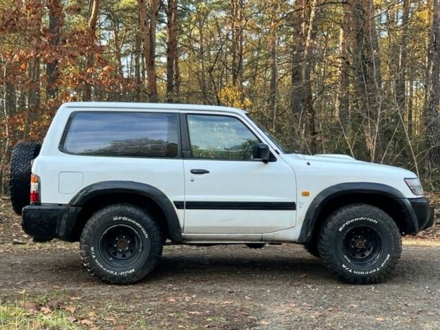 Серый Ниссан Патрол, объемом двигателя 3 л и пробегом 230 тыс. км за 3100 $, фото 4 на Automoto.ua