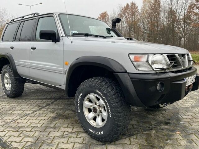 Серый Ниссан Патрол, объемом двигателя 3 л и пробегом 200 тыс. км за 4000 $, фото 1 на Automoto.ua