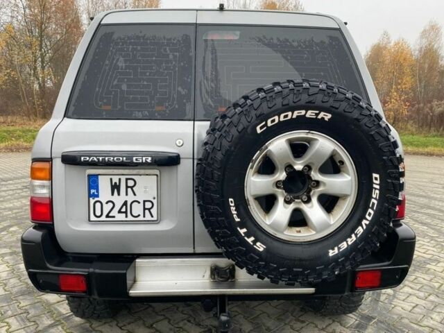 Серый Ниссан Патрол, объемом двигателя 3 л и пробегом 200 тыс. км за 4000 $, фото 6 на Automoto.ua