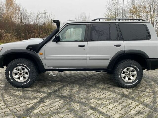 Серый Ниссан Патрол, объемом двигателя 3 л и пробегом 200 тыс. км за 4000 $, фото 3 на Automoto.ua