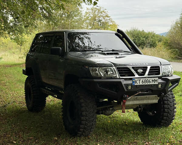 Серый Ниссан Патрол, объемом двигателя 2.5 л и пробегом 200 тыс. км за 66006 $, фото 1 на Automoto.ua