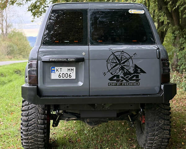 Серый Ниссан Патрол, объемом двигателя 2.5 л и пробегом 200 тыс. км за 66006 $, фото 4 на Automoto.ua