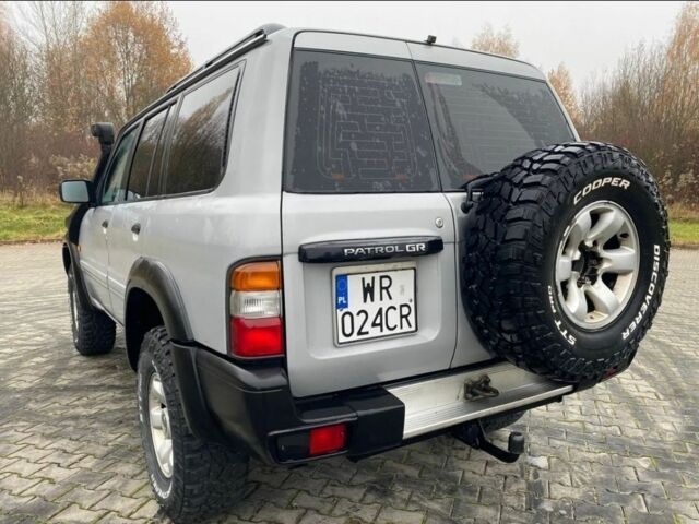 Серый Ниссан Патрол, объемом двигателя 3 л и пробегом 200 тыс. км за 4000 $, фото 4 на Automoto.ua