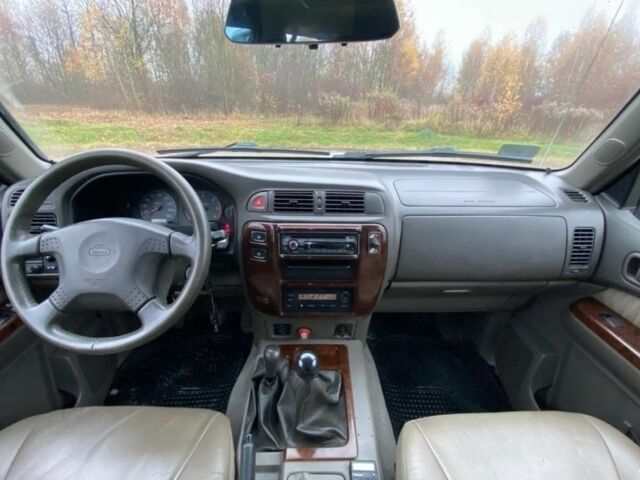 Серый Ниссан Патрол, объемом двигателя 3 л и пробегом 200 тыс. км за 4000 $, фото 9 на Automoto.ua