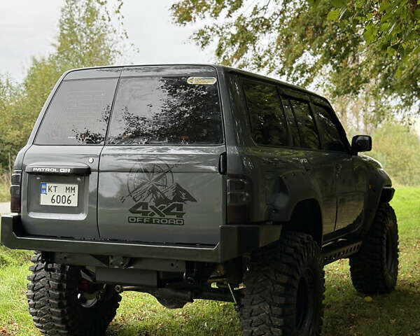 Серый Ниссан Патрол, объемом двигателя 2.5 л и пробегом 200 тыс. км за 66006 $, фото 5 на Automoto.ua