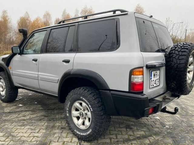 Серый Ниссан Патрол, объемом двигателя 3 л и пробегом 200 тыс. км за 4000 $, фото 5 на Automoto.ua